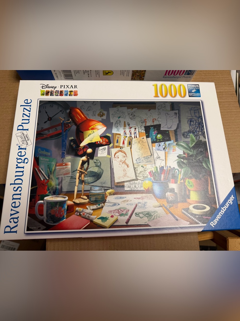 Ravensburger Pixar Illustrator’s Desk 1000 Piece Puzzle